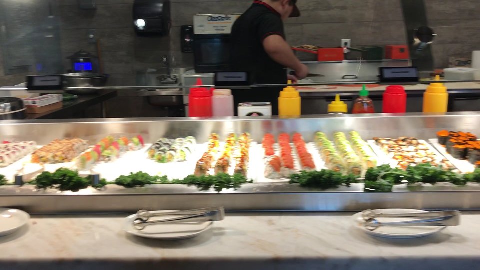 Sushi and seafood items on display
