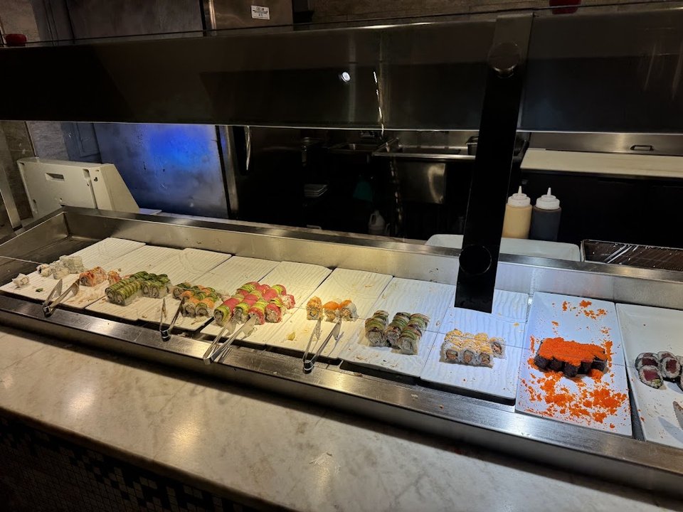Printed menu with buffet categories and specials